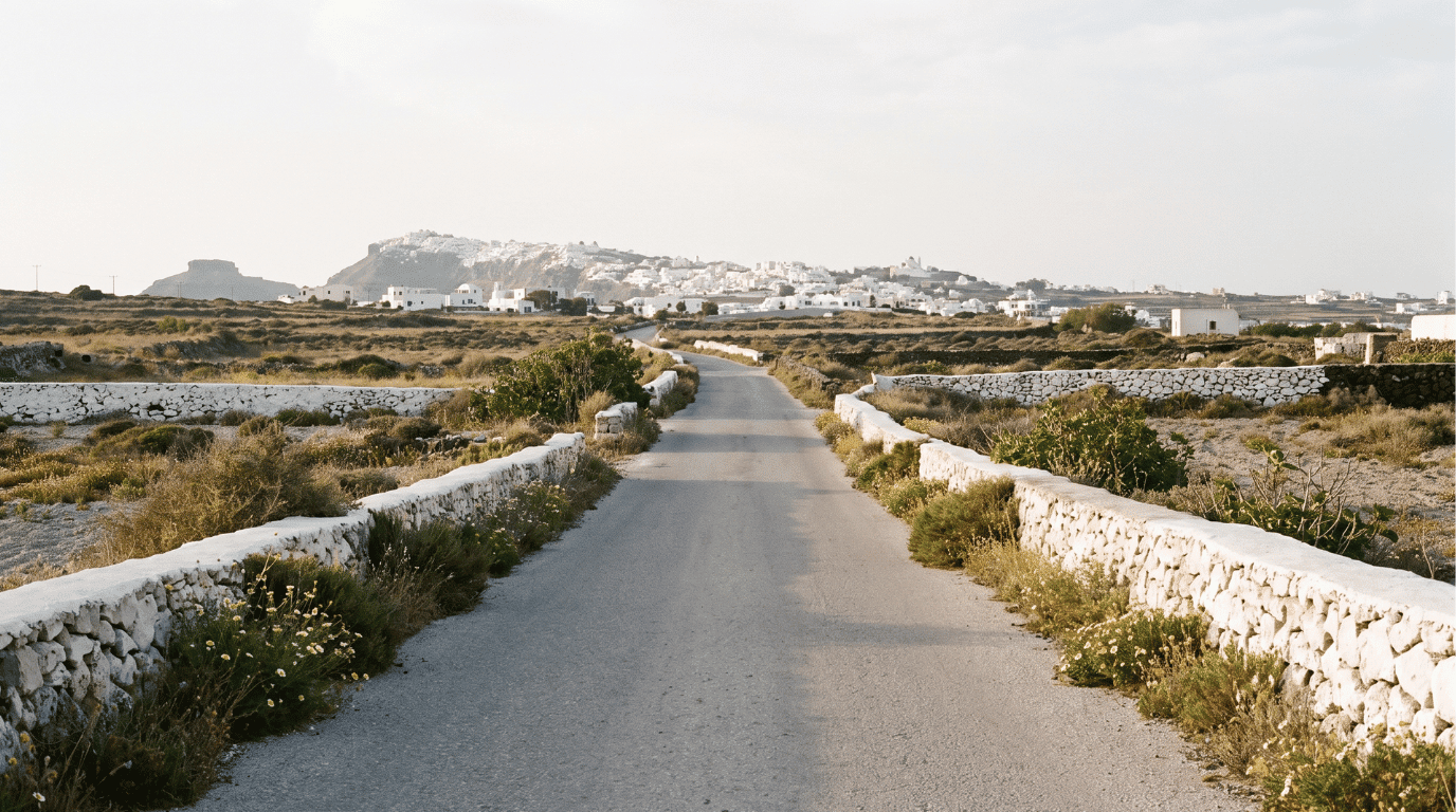 Quiet road through central Santorini connecting Karterados to Fira, about 1.6 km away